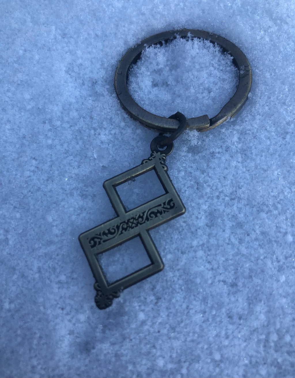 Twisted One Symbol - Blasphemous Inspired Double-sided Keychain