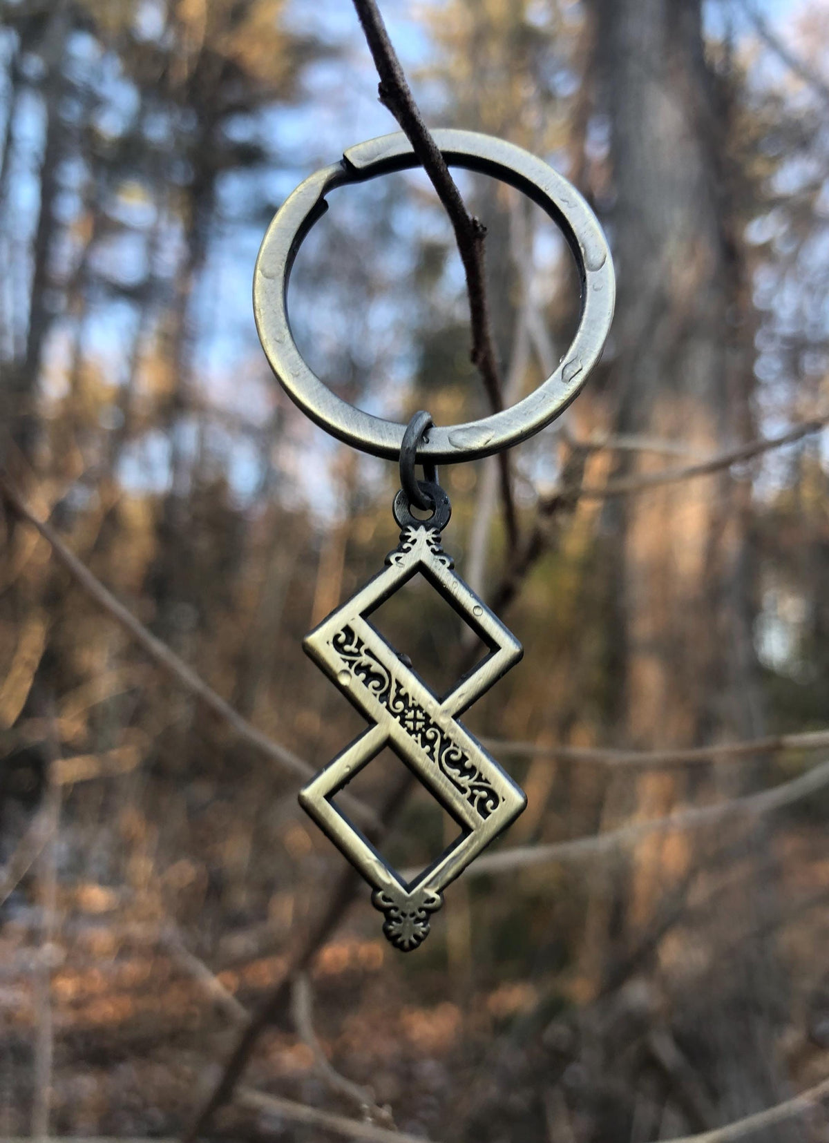 Twisted One Symbol - Blasphemous Inspired Double-sided Keychain