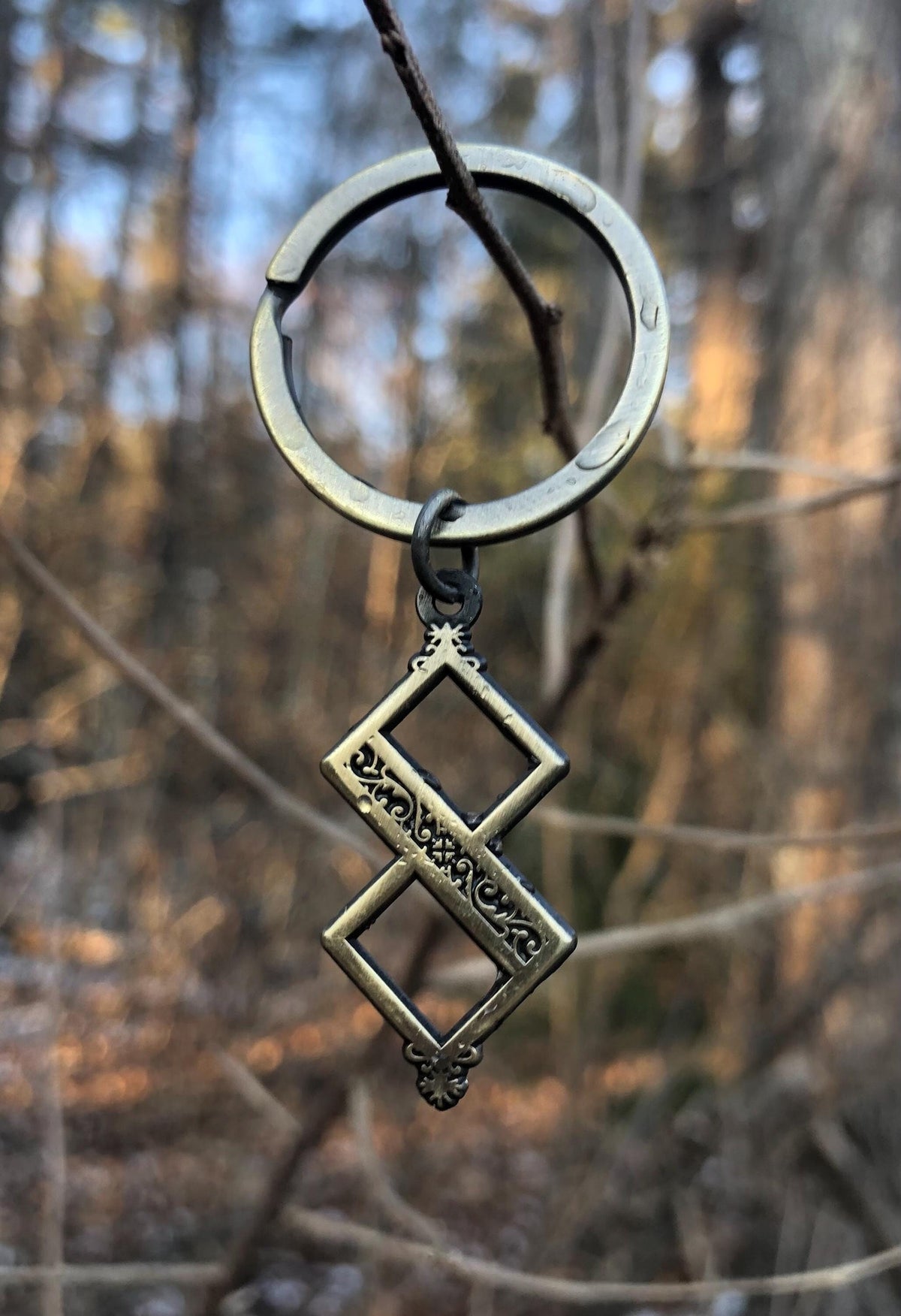 Twisted One Symbol - Blasphemous Inspired Double-sided Keychain